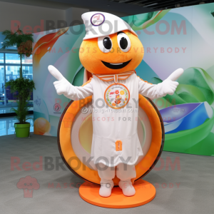 Peach Ring Master mascot costume character dressed with a Polo Shirt and Shawl pins