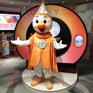 Peach Ring Master mascot costume character dressed with a Polo Shirt and Shawl pins