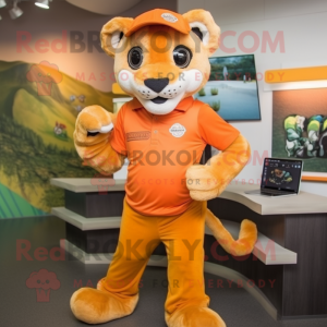 Orange Mountain Lion mascot costume character dressed with a Shorts and Caps