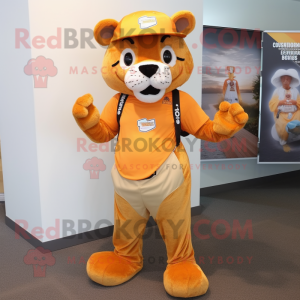 Orange Mountain Lion mascot costume character dressed with a Shorts and Caps