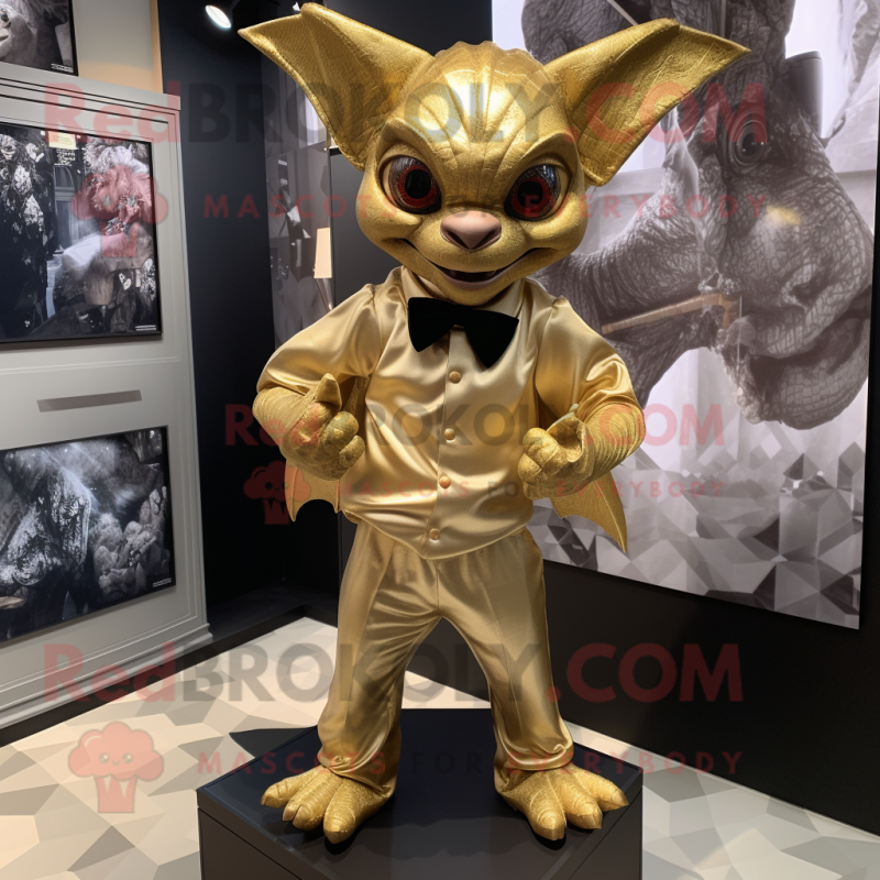 Gold Gargoyle mascot costume character dressed with a Playsuit and Bow ties