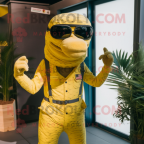 Yellow Anaconda mascot costume character dressed with a Dungarees and Sunglasses