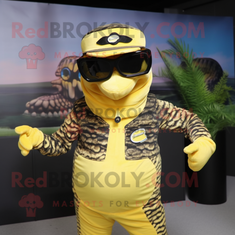 Yellow Anaconda mascot costume character dressed with a Dungarees and Sunglasses