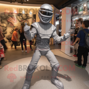 Silver Commando mascot costume character dressed with a Long Sleeve Tee and Headbands