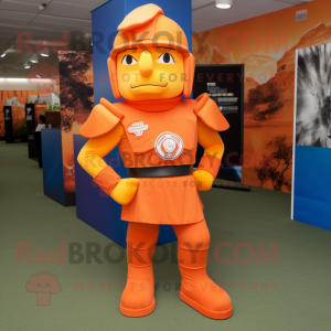 Orange Spartan Soldier mascot costume character dressed with a Polo Tee and Tie pins