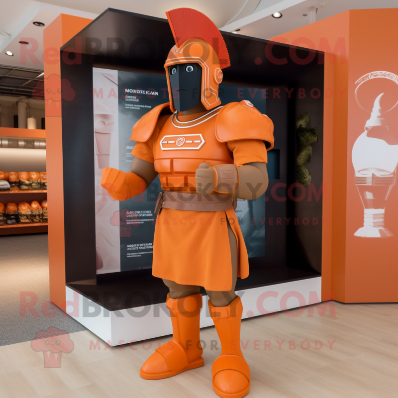 Orange Spartan Soldier mascot costume character dressed with a Polo Tee and Tie pins