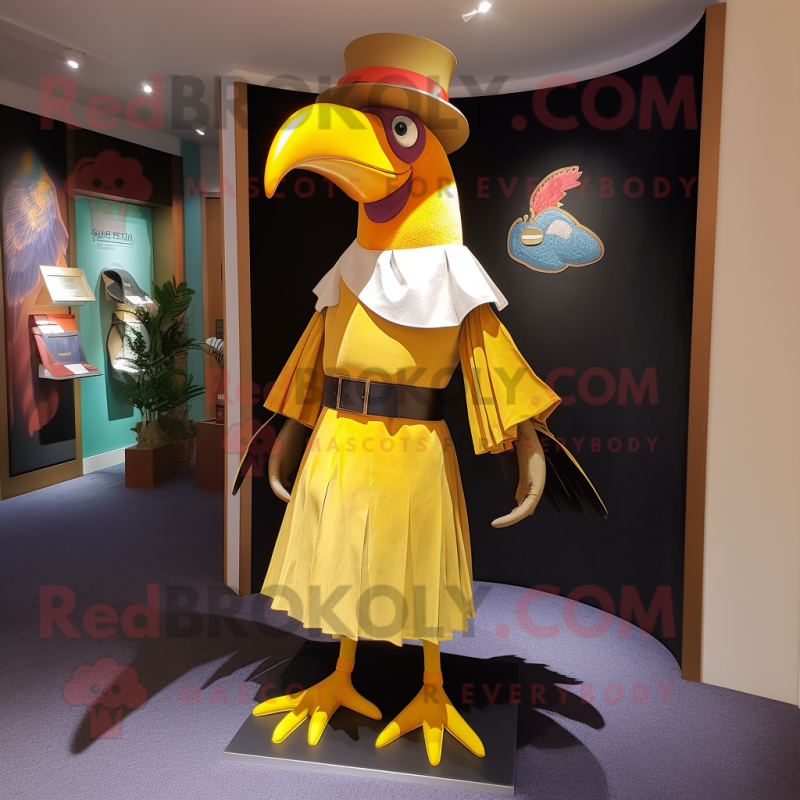 Gold Toucan mascot costume character dressed with a A-Line Dress and Belts