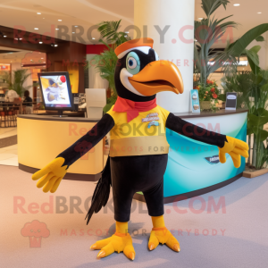 Gold Toucan mascot costume character dressed with a A-Line Dress and Belts