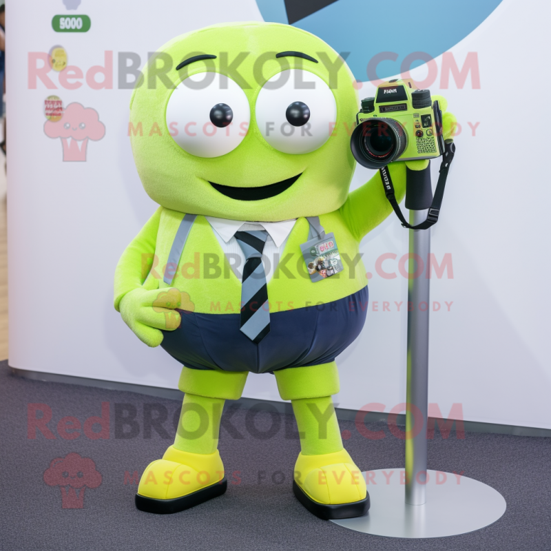 Lime Green Camera mascot costume character dressed with a Oxford Shirt and Ties