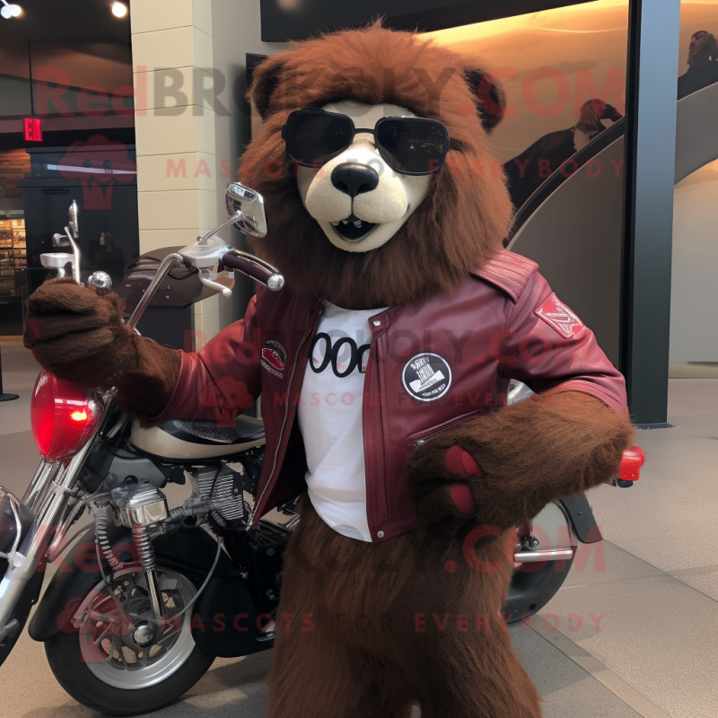 Maroon Sloth Bear mascot costume character dressed with a Moto Jacket and Sunglasses Maroon Sloth Bear mascot costume character dressed with a Moto Jacket and Sunglasses