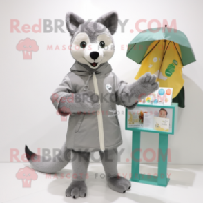 Gray Dingo mascot costume character dressed with a Raincoat and Coin purses