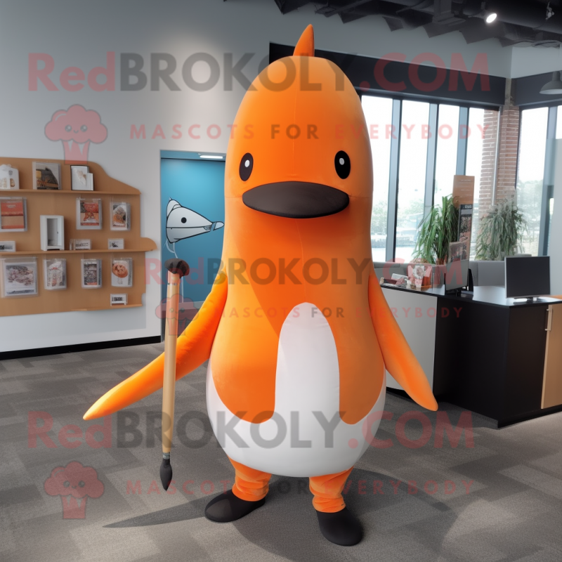 Orange Narwhal mascot costume character dressed with a Dress Pants and Hat pins