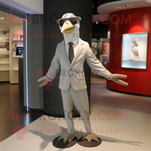 Silver Albatross mascot costume character dressed with a Sheath Dress and Ties