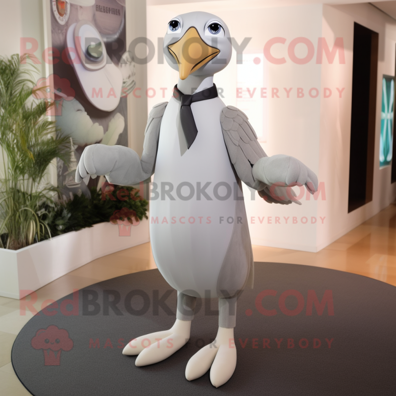 Silver Albatross mascot costume character dressed with a Sheath Dress and Ties