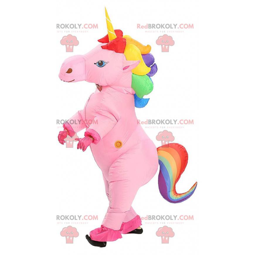 Mascota de unicornio inflable rosa con una melena multicolor -