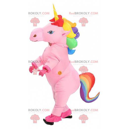 Rosa aufblasbares Einhorn-Maskottchen mit einer bunten Mähne -