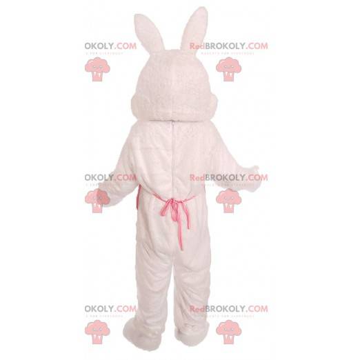 Mascota conejo blanco con chaleco amarillo con puntos de