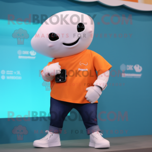 Peach Beluga Whale mascot costume character dressed with a Jeans and Smartwatches