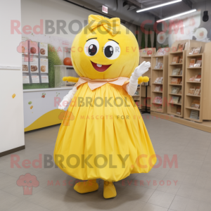 Yellow Apricot mascot costume character dressed with a Skirt and Cummerbunds