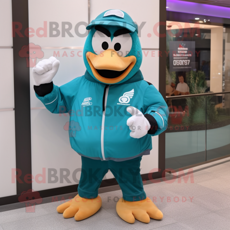 Teal Wrist Watch mascot costume character dressed with a Windbreaker and Mittens Teal Wrist Watch mascot costume character dressed with a Windbreaker and Mittens