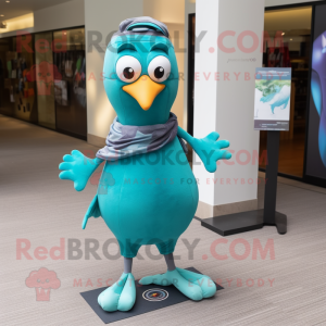 Turquoise Quail mascot costume character dressed with a Trousers and Anklets