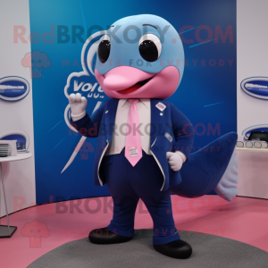 Pink Blue Whale mascot costume character dressed with a Suit Jacket and Rings