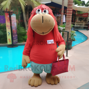 Red Walrus mascot costume character dressed with a Bermuda Shorts and Tote bags