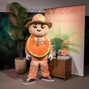 Tan Grapefruit mascot costume character dressed with a Chinos and Hair clips