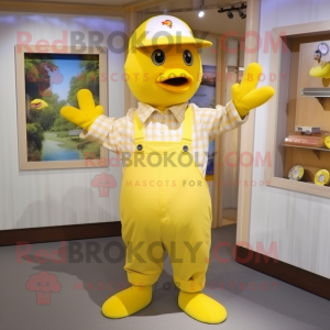 Lemon Yellow Dove mascot costume character dressed with a Dungarees and Hat pins