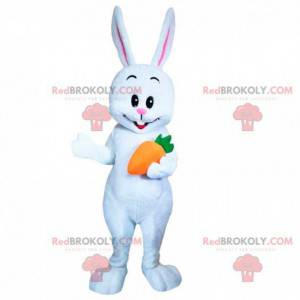 Weißes Kaninchenmaskottchen mit einem Karotten-, Nagetierkostüm