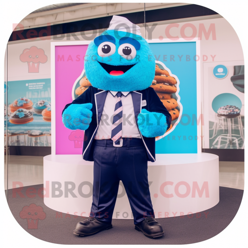 Blue Cupcake mascot costume character dressed with a Blazer and Digital watches Blue Cupcake mascot costume character dressed with a Blazer and Digital watches
