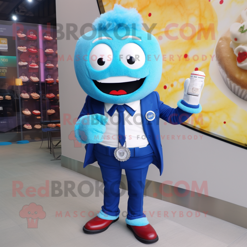 Blue Cupcake mascot costume character dressed with a Blazer and Digital watches Blue Cupcake mascot costume character dressed with a Blazer and Digital watches