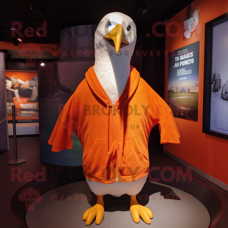 Orange Albatross mascot costume character dressed with a V-Neck Tee and Shawl pins