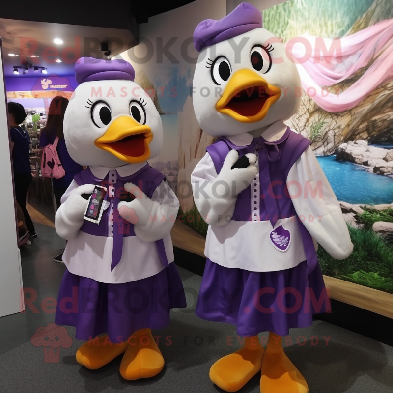 Purple Geese mascot costume character dressed with a Blouse and Keychains Purple Geese mascot costume character dressed with a Blouse and Keychains