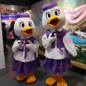 Purple Geese mascot costume character dressed with a Blouse and Keychains