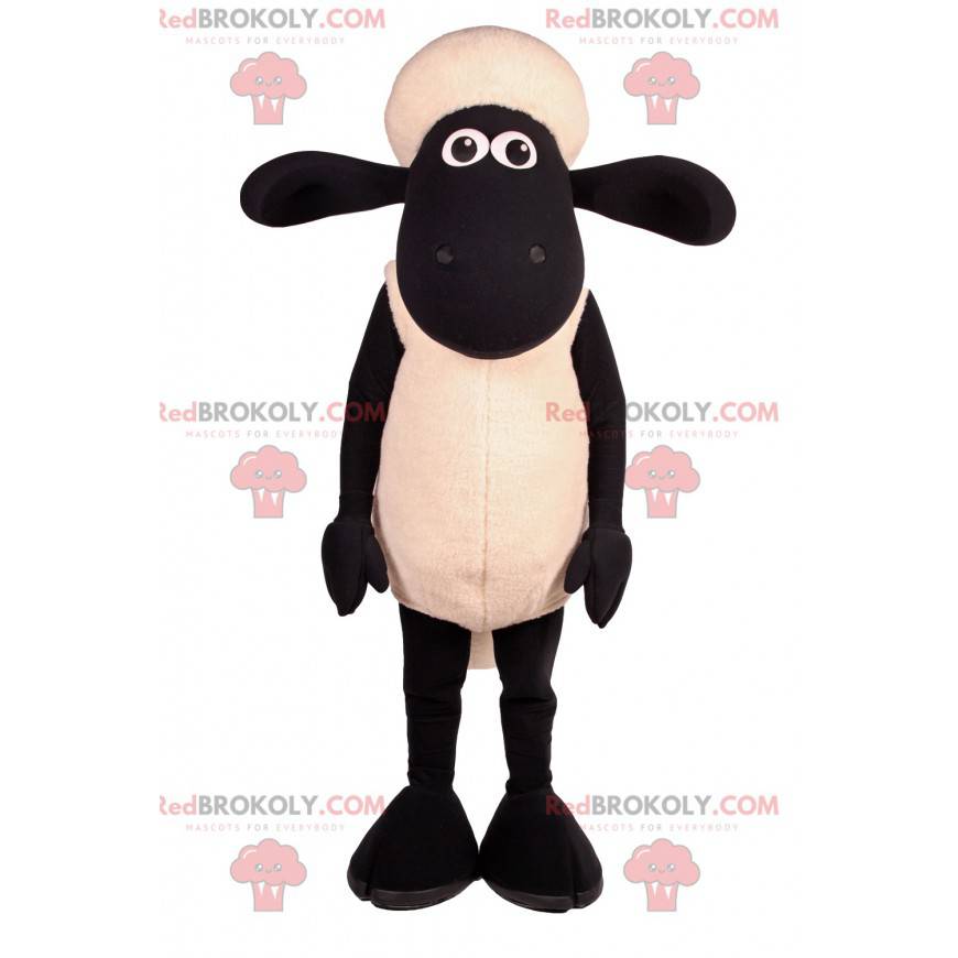 Mascotte delle pecore in bianco e nero con le grandi orecchie -