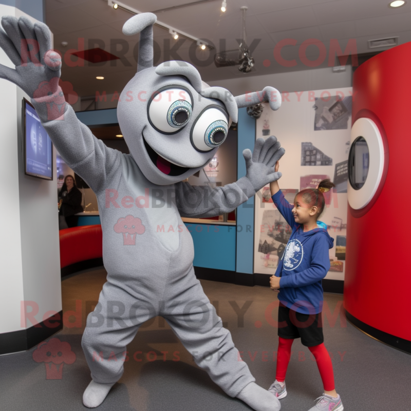 Gray Contortionist mascot costume character dressed with a Long Sleeve Tee and Watches Gray Contortionist mascot costume character dressed with a Long Sleeve Tee and Watches