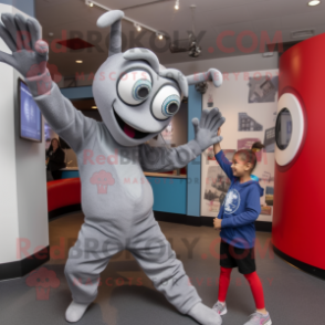 Gray Contortionist mascot costume character dressed with a Long Sleeve Tee and Watches