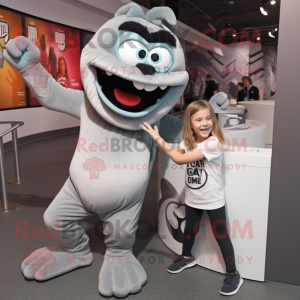 Gray Contortionist mascot costume character dressed with a Long Sleeve Tee and Watches