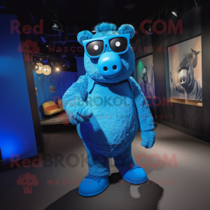 Blue Sow mascot costume character dressed with a Bodysuit and Eyeglasses