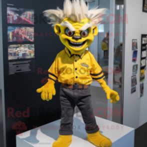 Yellow Vampire mascot costume character dressed with a Oxford Shirt and Hair clips