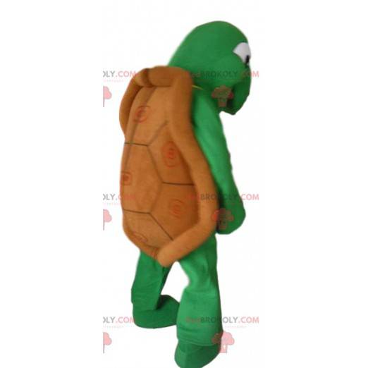 Mascotte tartaruga verde e il suo guscio marrone -