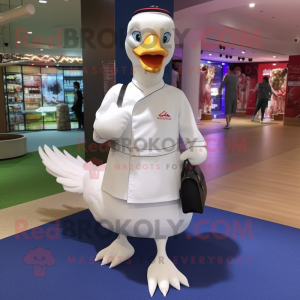 White Swan mascot costume character dressed with a Polo Tee and Clutch bags