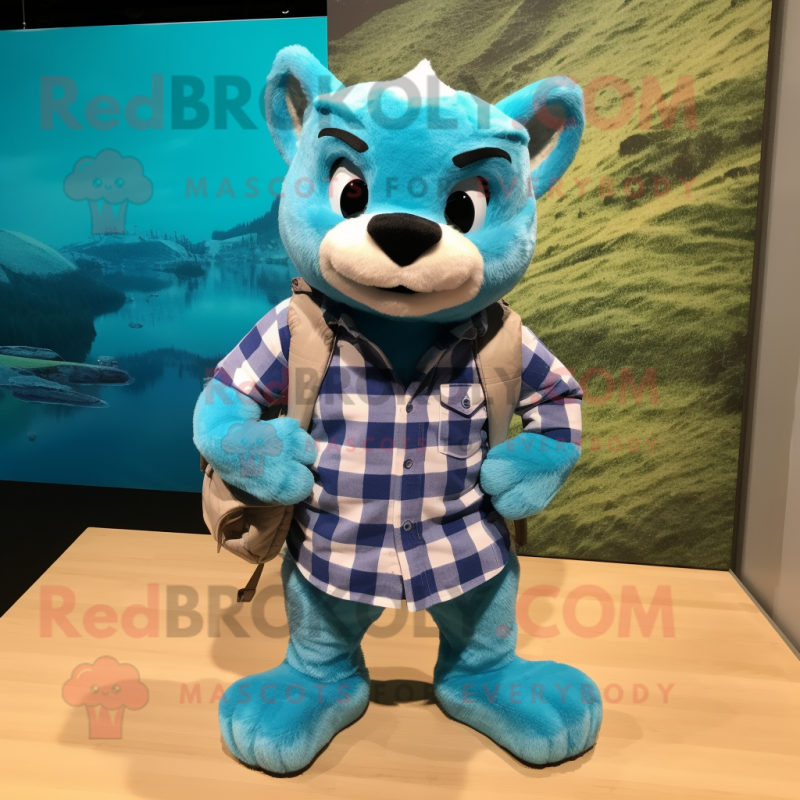 Turquoise Puma mascot costume character dressed with a Flannel Shirt and Clutch bags