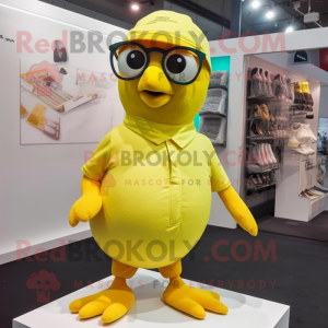 Lemon Yellow Pigeon mascot costume character dressed with a Shorts and Eyeglasses
