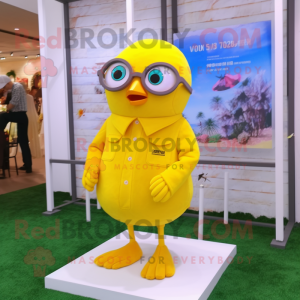 Lemon Yellow Pigeon mascot costume character dressed with a Shorts and Eyeglasses