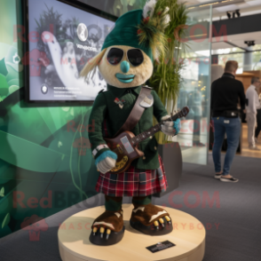 Olive Bagpipe mascot costume character dressed with a Playsuit and Digital watches