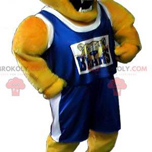 Mascote urso amarelo em roupas esportivas - Redbrokoly.com