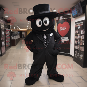 Black Heart mascot costume character dressed with a Suit Pants and Hat pins