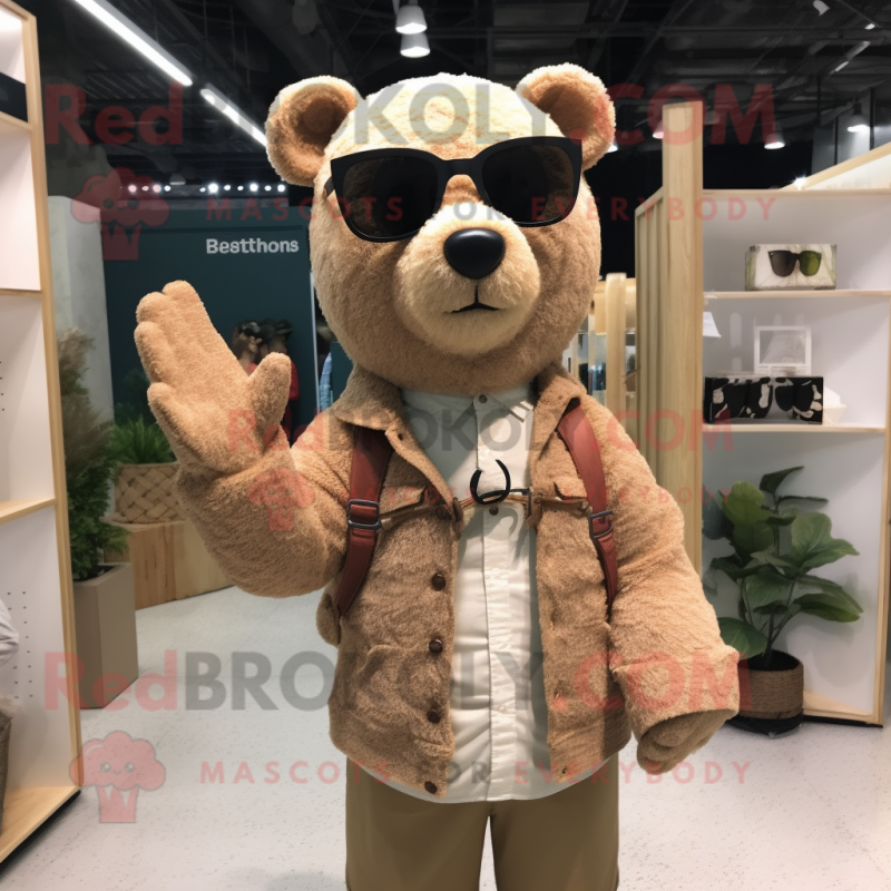 Beige Bear mascot costume character dressed with a Cardigan and Sunglasses